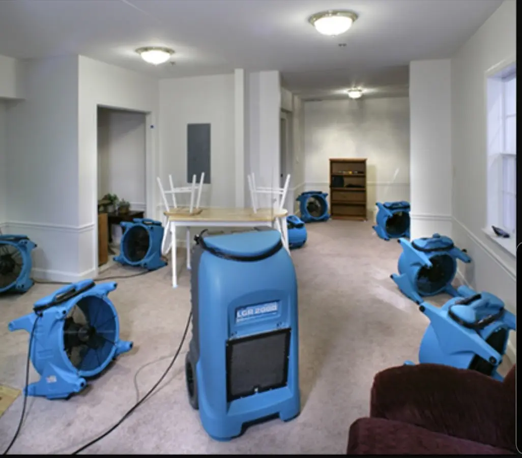Air movers and dehumidifier setup for Water Damage Restoration in Flint